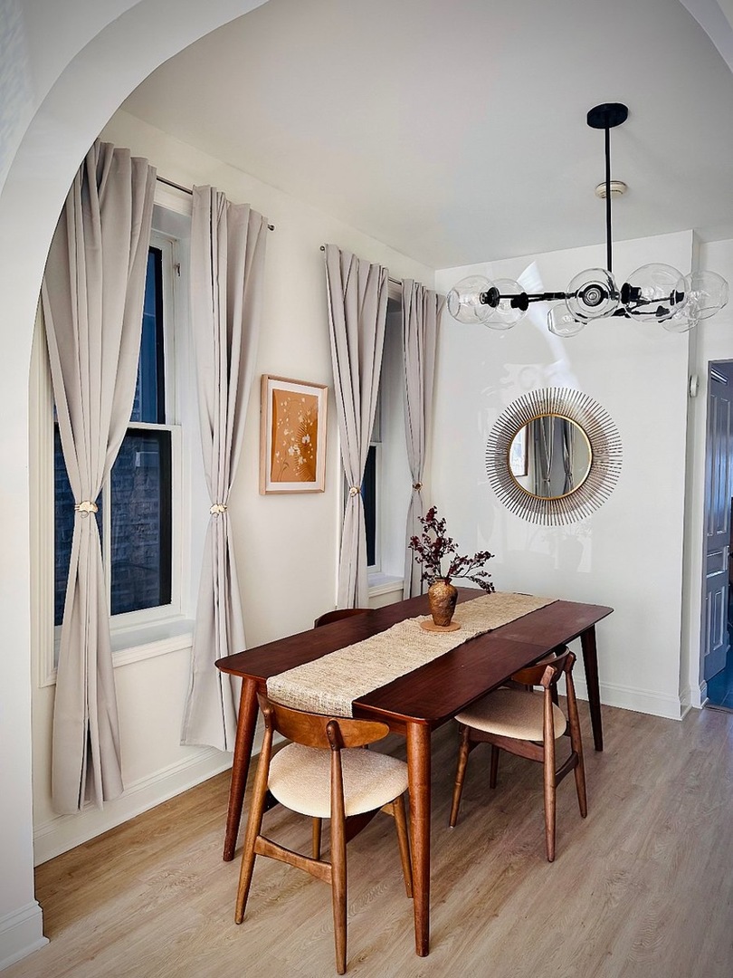 2014 North Oakley Avenue, Unit 1 Chicago, IL 60647 - Photo 6 of 19 a view of a dining room with furniture and a table