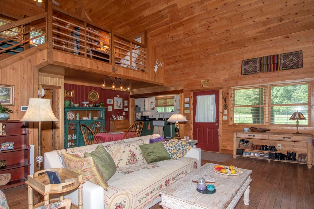 41 Pine Trail Warne, NC 28909 - Photo 11 of 43 a living room with furniture and a large window