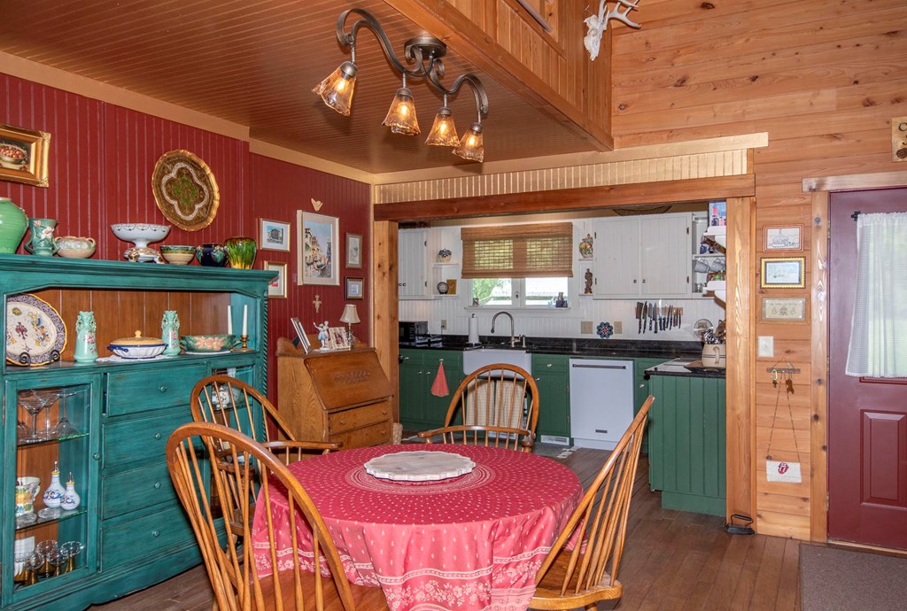 41 Pine Trail Warne, NC 28909 - Photo 14 of 43 a dining room with furniture and wooden floor