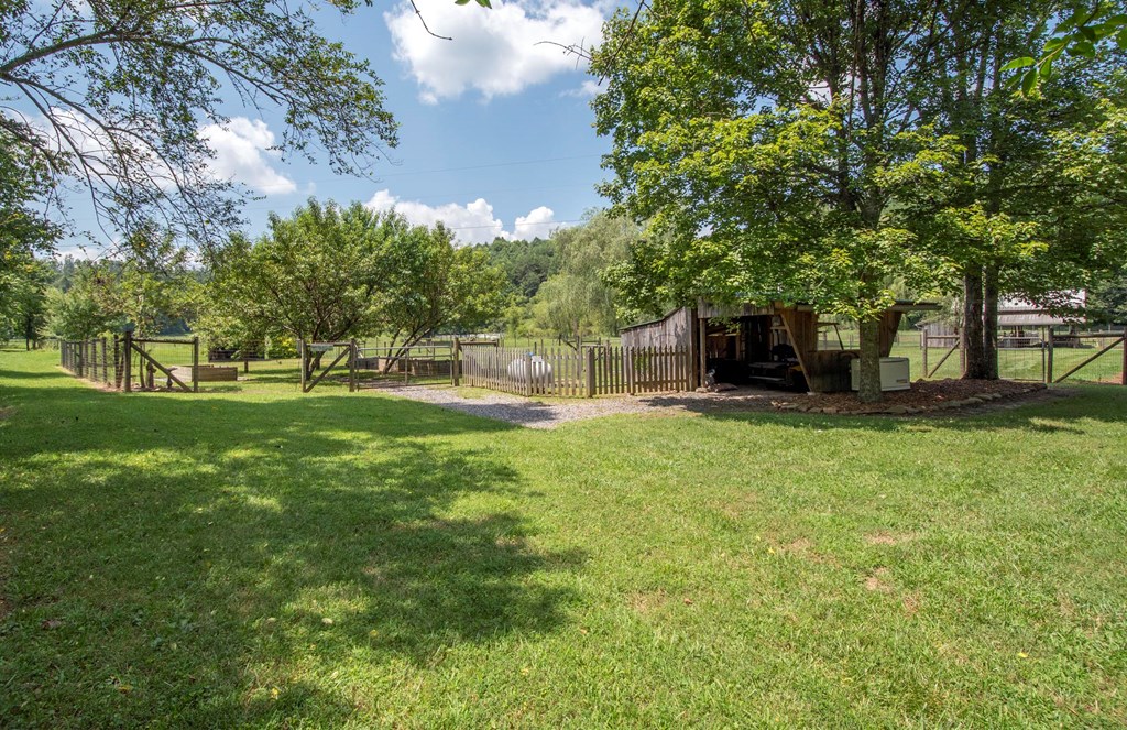 41 Pine Trail Warne, NC 28909 - Photo 40 of 43 a view of a house with a yard