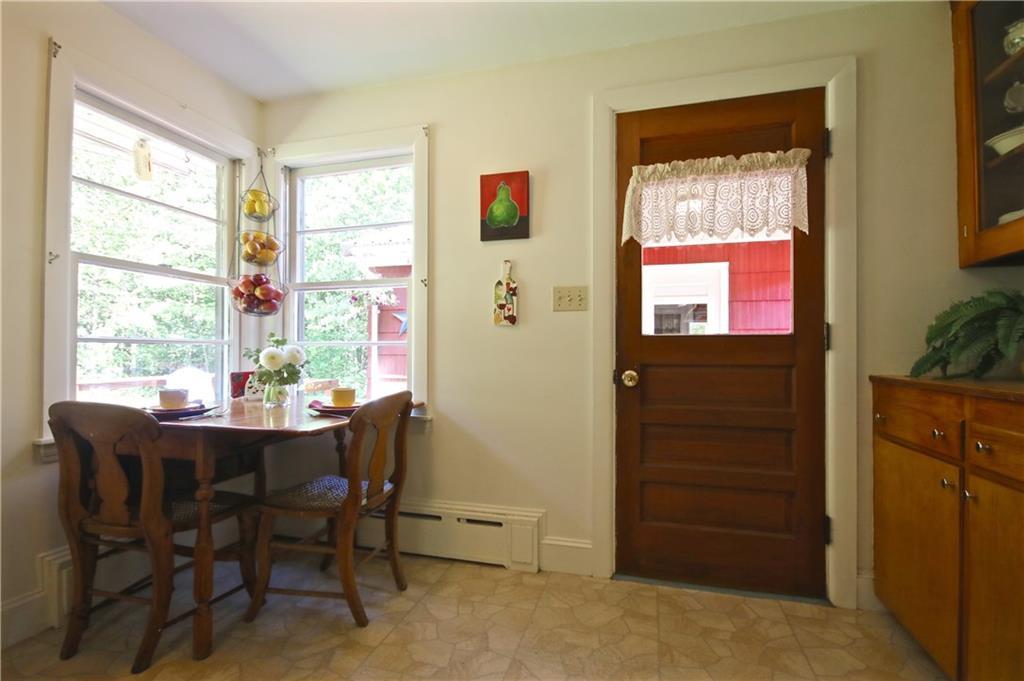 115 Sebago Lake Road Gorham, ME 04038 - Photo 14 of 35 Sunny and bright Kitchen with built-ins.
