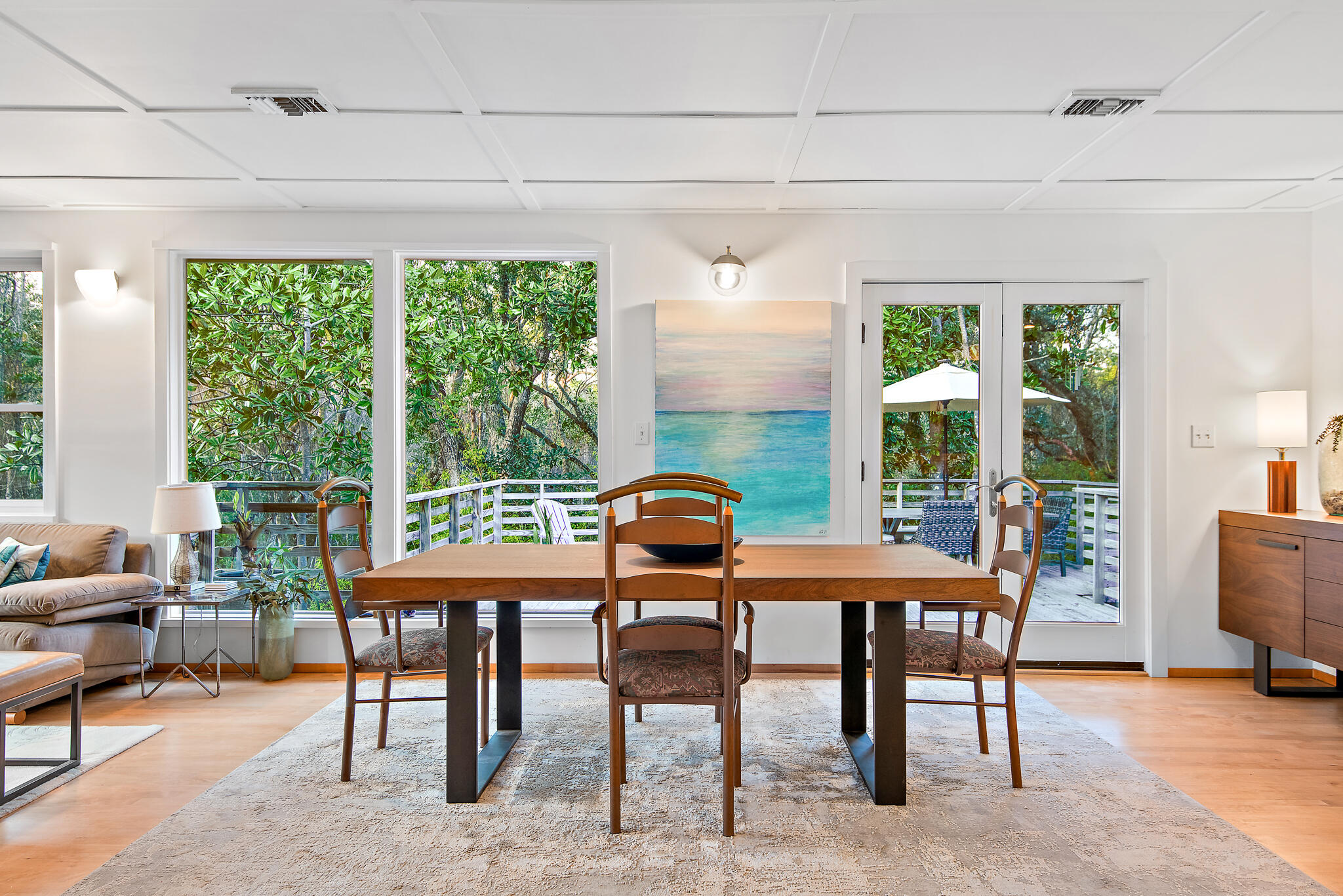235 North Bishop Road Santa Rosa Beach, FL 32459 - Photo 14 of 68 a dining room with furniture and wooden floor