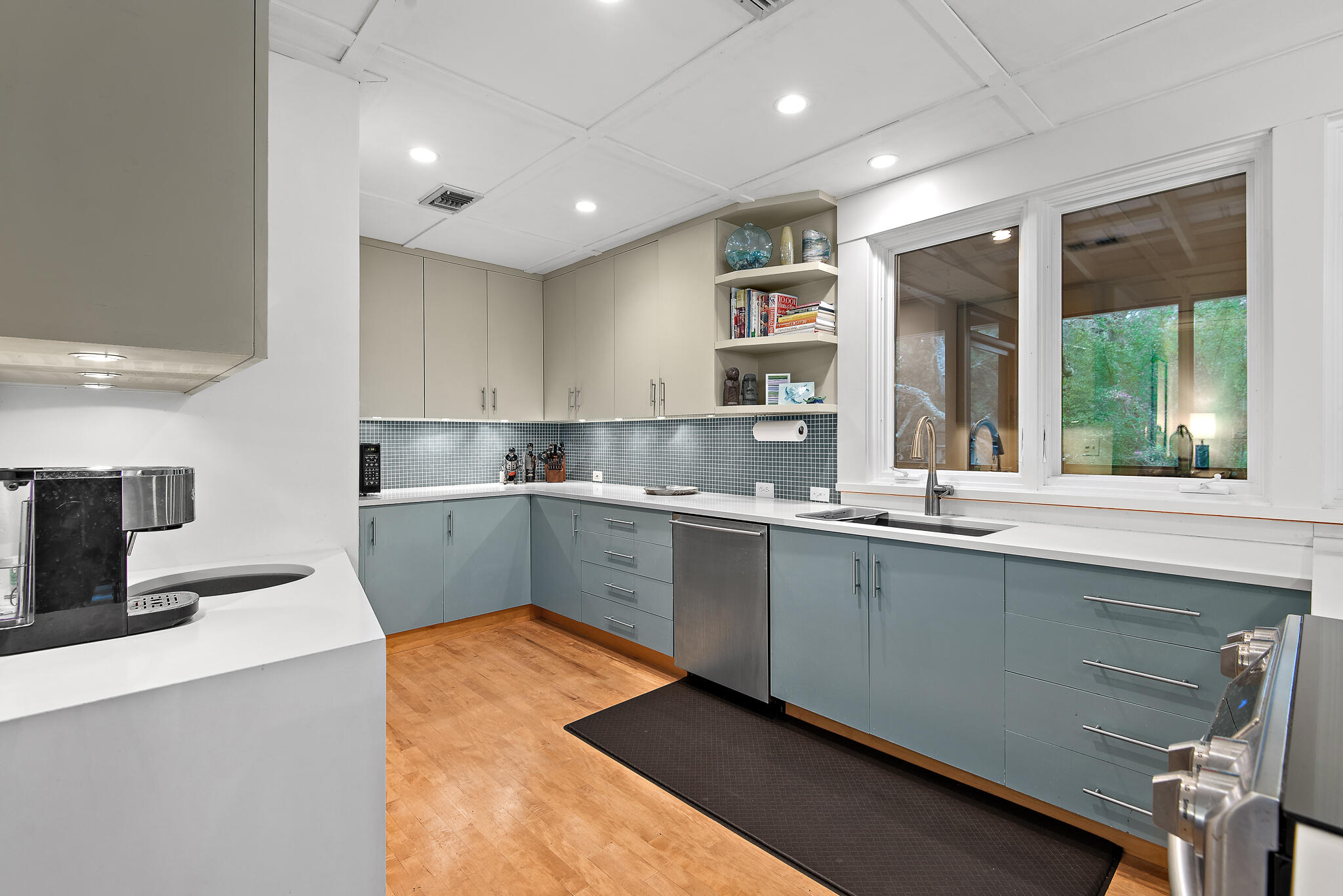235 North Bishop Road Santa Rosa Beach, FL 32459 - Photo 16 of 68 a kitchen with granite countertop a sink stainless steel appliances and cabinets