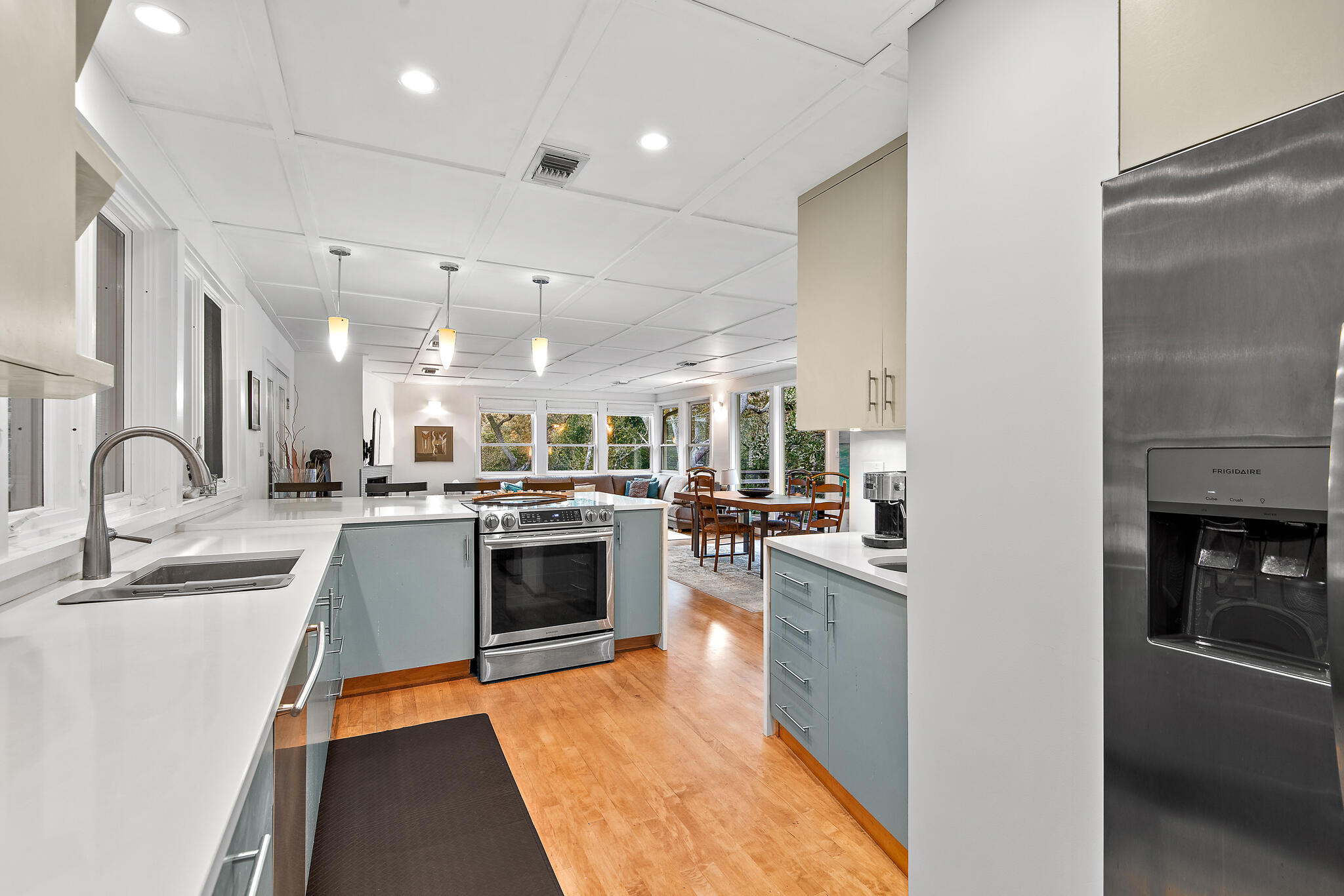 235 North Bishop Road Santa Rosa Beach, FL 32459 - Photo 17 of 68 a large kitchen with stainless steel appliances kitchen island a stove a sink a refrigerator and a stove