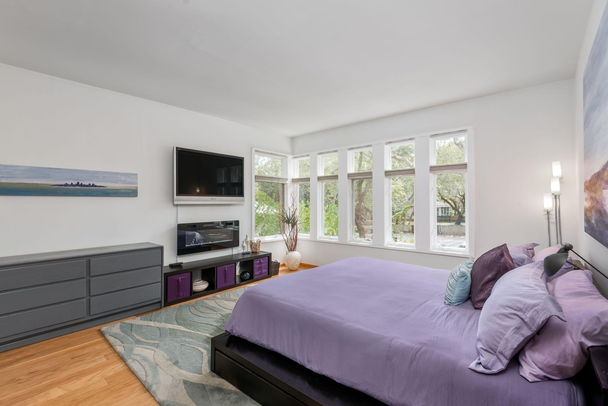 235 North Bishop Road Santa Rosa Beach, FL 32459 - Photo 24 of 68 a bedroom with a bed and a flat screen tv