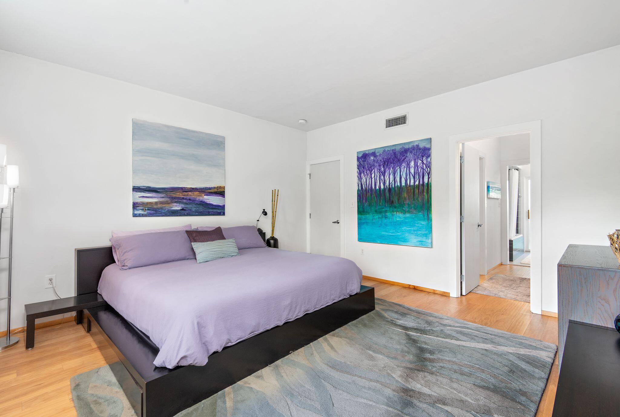 235 North Bishop Road Santa Rosa Beach, FL 32459 - Photo 25 of 68 a bedroom with a bed and a view of bathroom