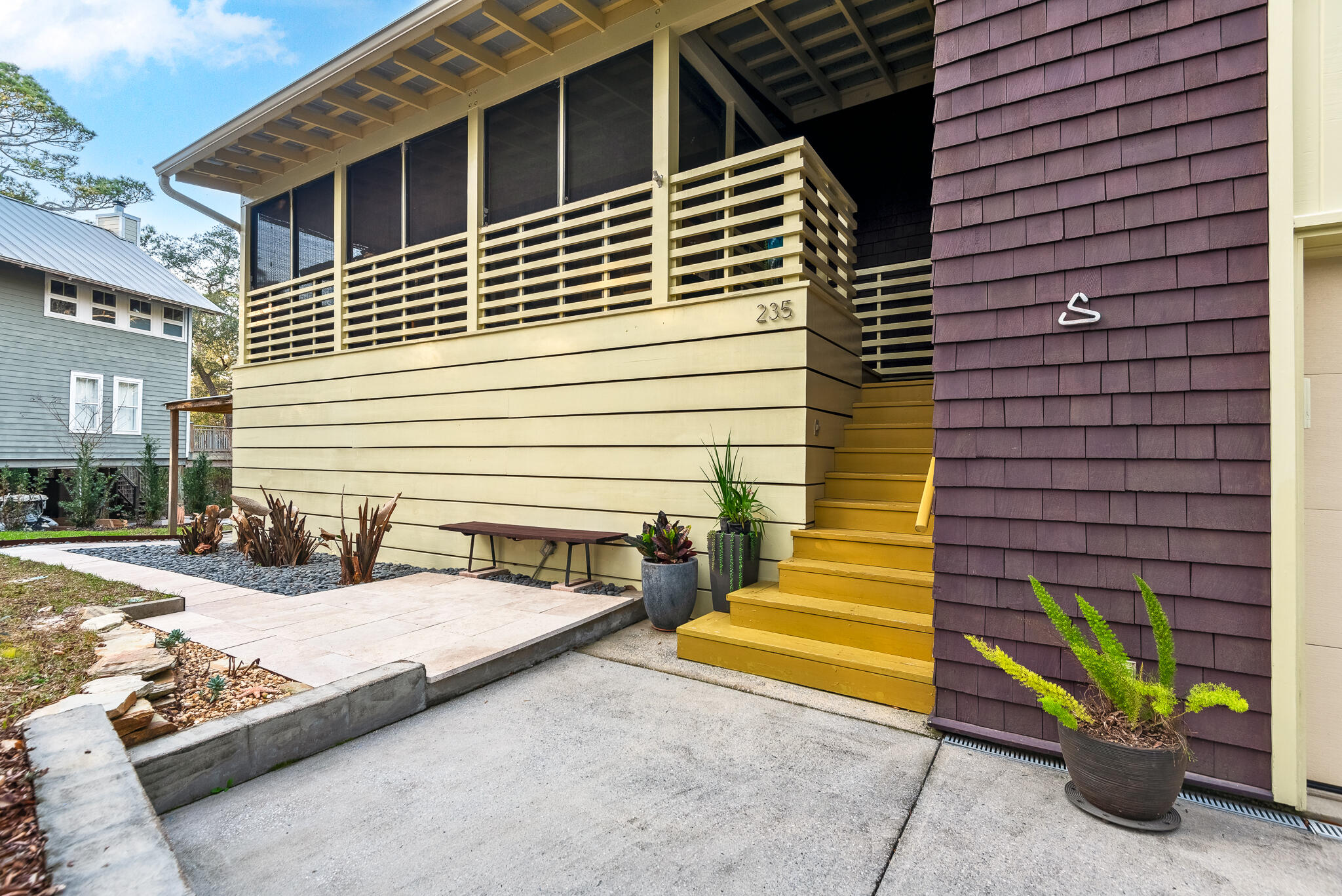 235 North Bishop Road Santa Rosa Beach, FL 32459 - Photo 5 of 68 a view of backyard with a chair and tables