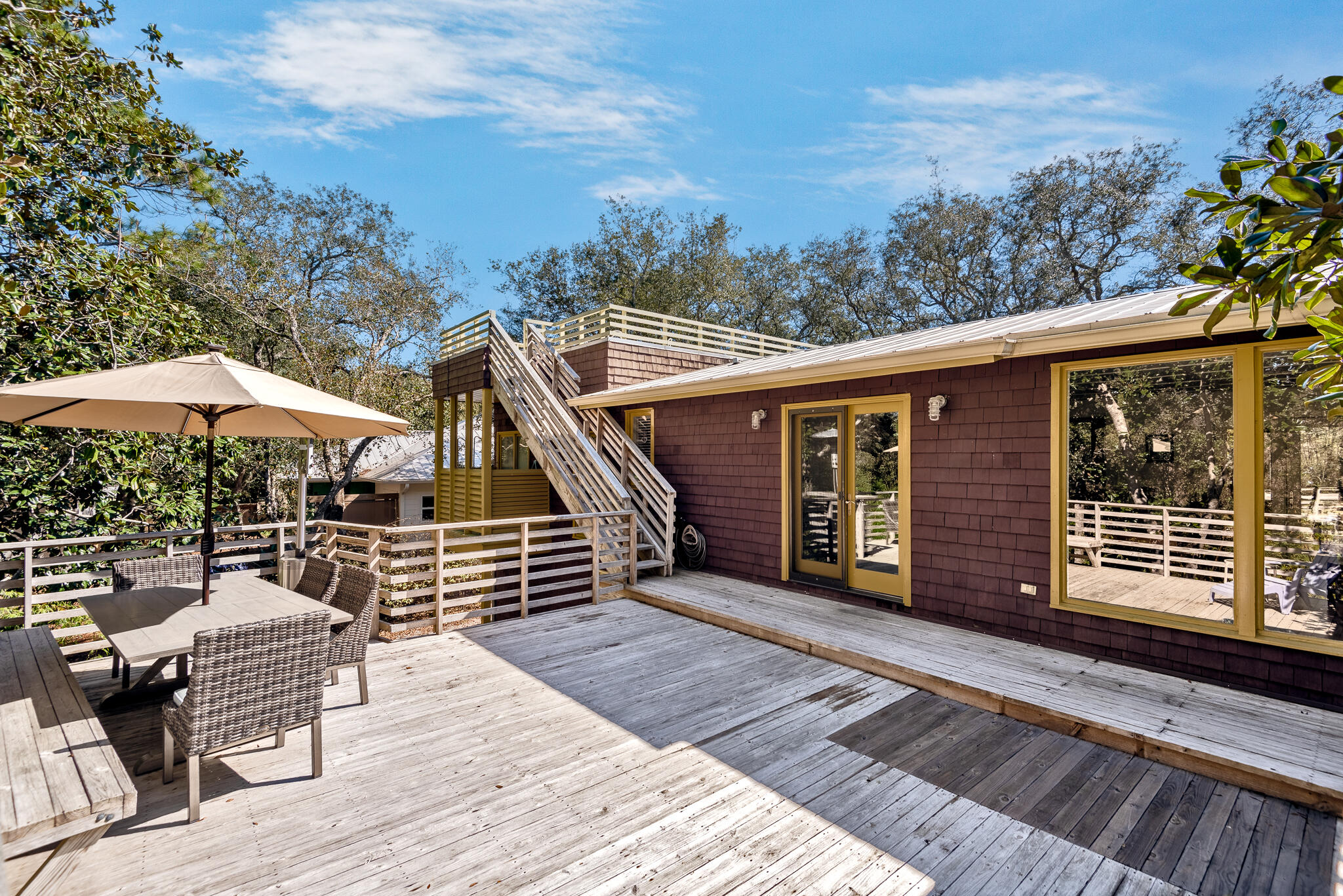 235 North Bishop Road Santa Rosa Beach, FL 32459 - Photo 56 of 68 a view of a roof deck with chair and wooden floor