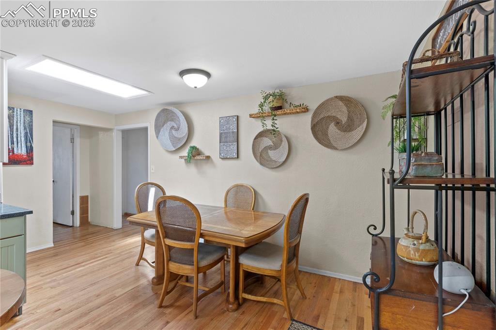 1215 Sunset Road Colorado Springs, CO 80909 - Photo 14 of 40 Dining area has plenty of room for gatherings!