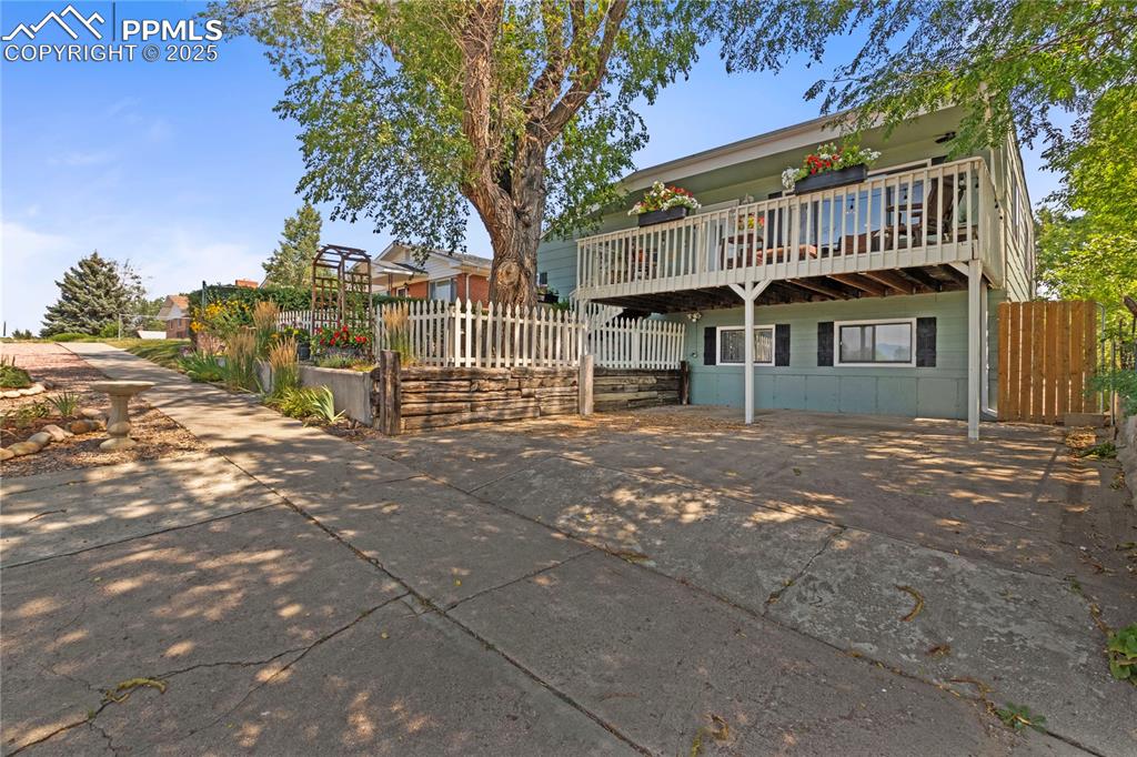 1215 Sunset Road Colorado Springs, CO 80909 - Photo 2 of 40 Angled view of front