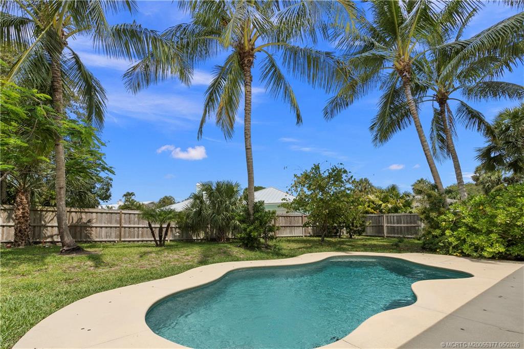 a view of a house with a swimming pool
