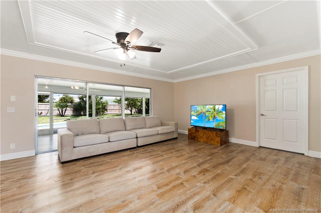 53 North Sewalls Point Road Sewall's Point, FL 34996 - Photo 12 of 55 a living room with furniture and a flat screen tv