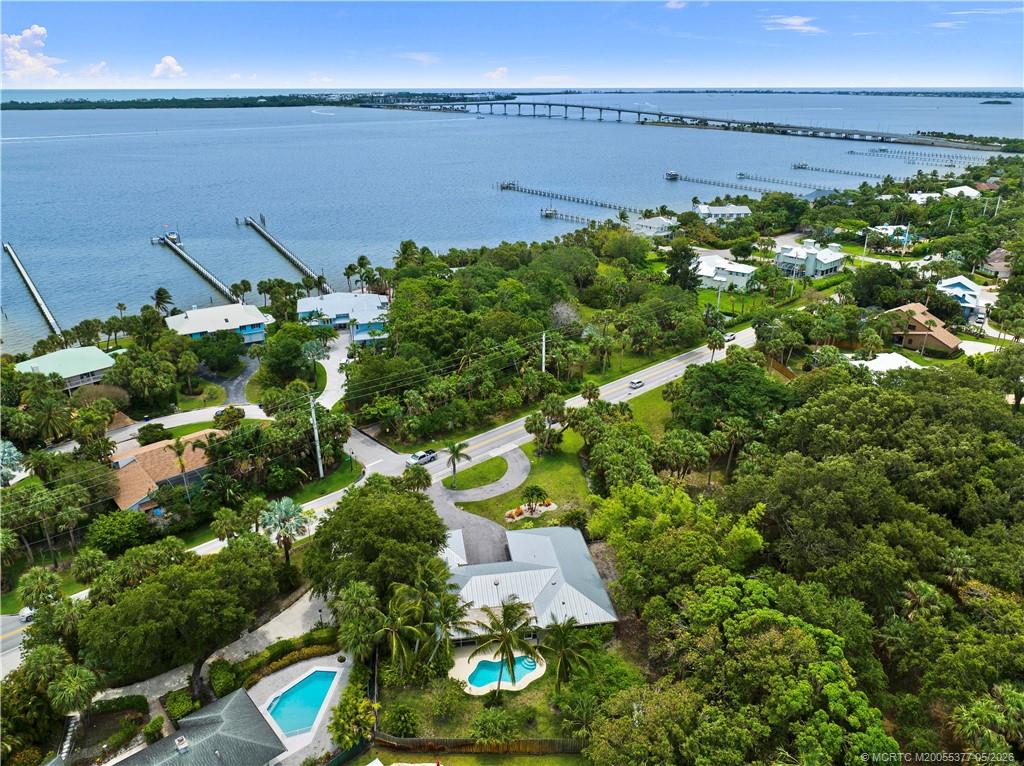 53 North Sewalls Point Road Sewall's Point, FL 34996 - Photo 2 of 55 an aerial view of a houses with a yard