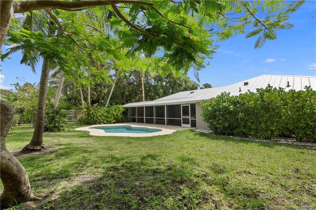 53 North Sewalls Point Road Sewall's Point, FL 34996 - Photo 45 of 55 a view of a house with a yard and sitting area