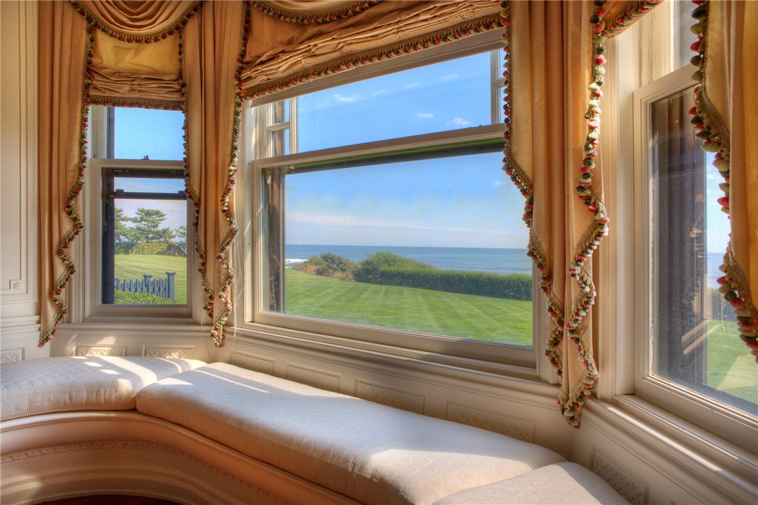 225 Ruggles Avenue Newport, RI 02840 - Photo 22 of 40 First floor cushioned window seat with Atlantic Ocean in the distance.