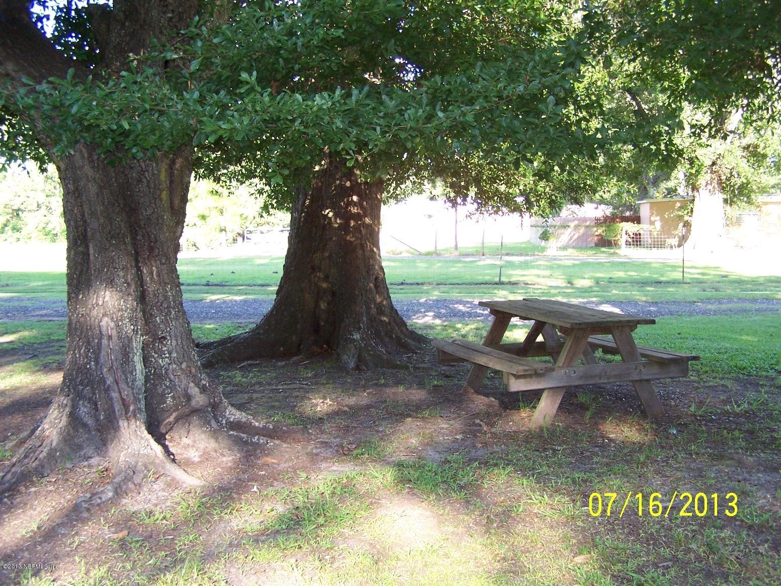 54210 Hurst Road Callahan, FL 32011 - Photo 11 of 12 a view of outdoor space with garden