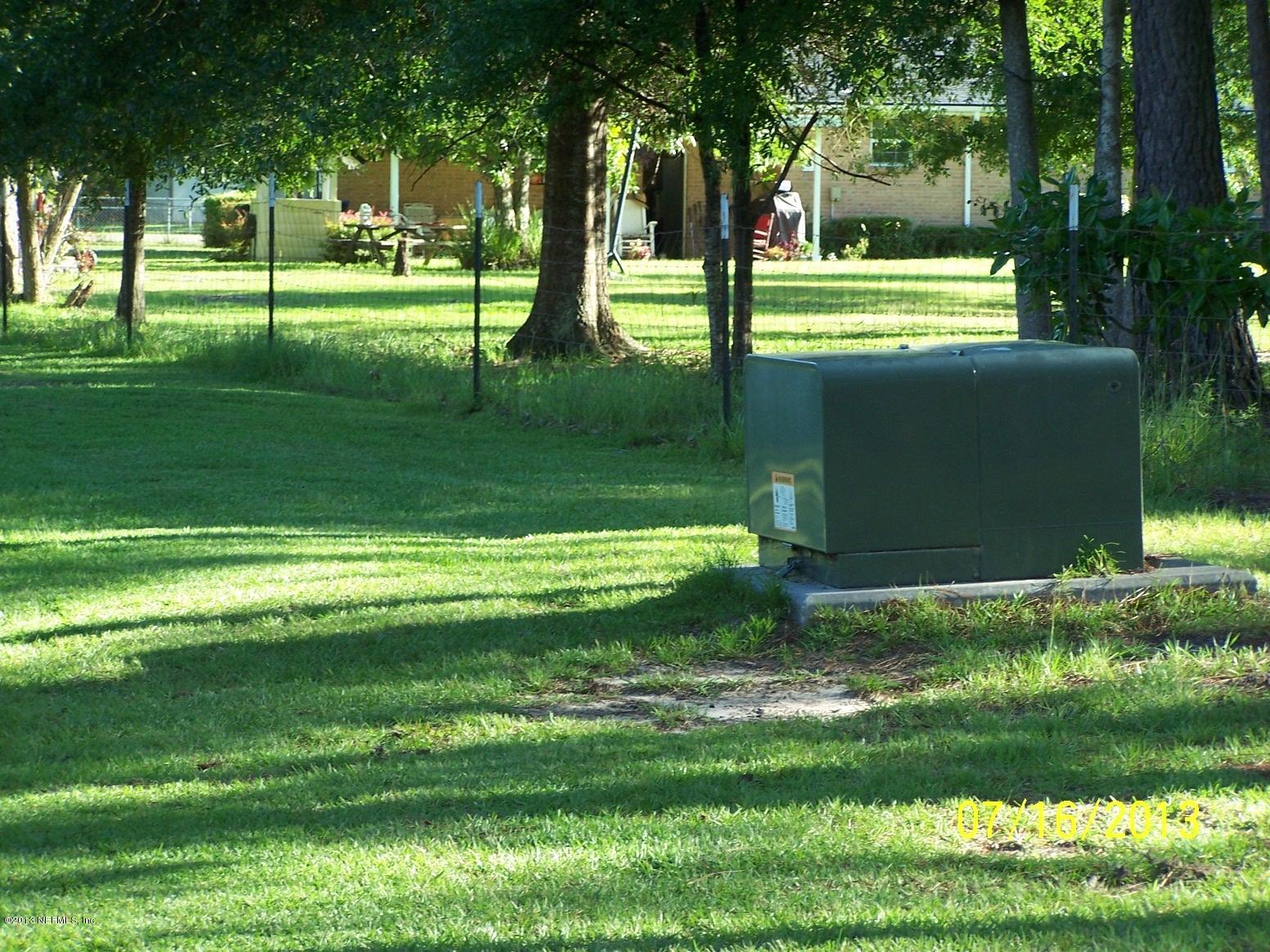 54210 Hurst Road Callahan, FL 32011 - Photo 8 of 12 a view of a park with large trees