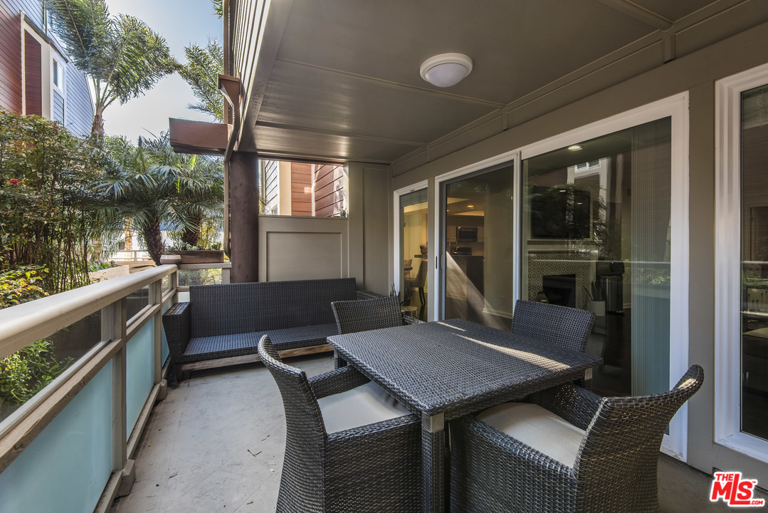 4200 Vía Dolce, Unit 129 Marina del Rey, CA 90292 - Photo 21 of 30 a outdoor dining space with furniture
