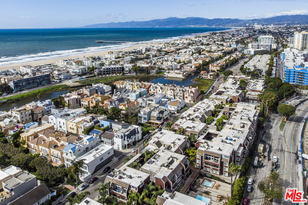 4200 Vía Dolce, Unit 129 Marina del Rey, CA 90292 - Photo 26 of 30 an aerial view of residential building and ocean