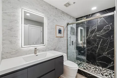 a view of a city with tall buildings