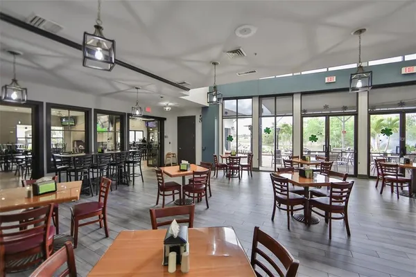 a view of a dining room with furniture window and outside view