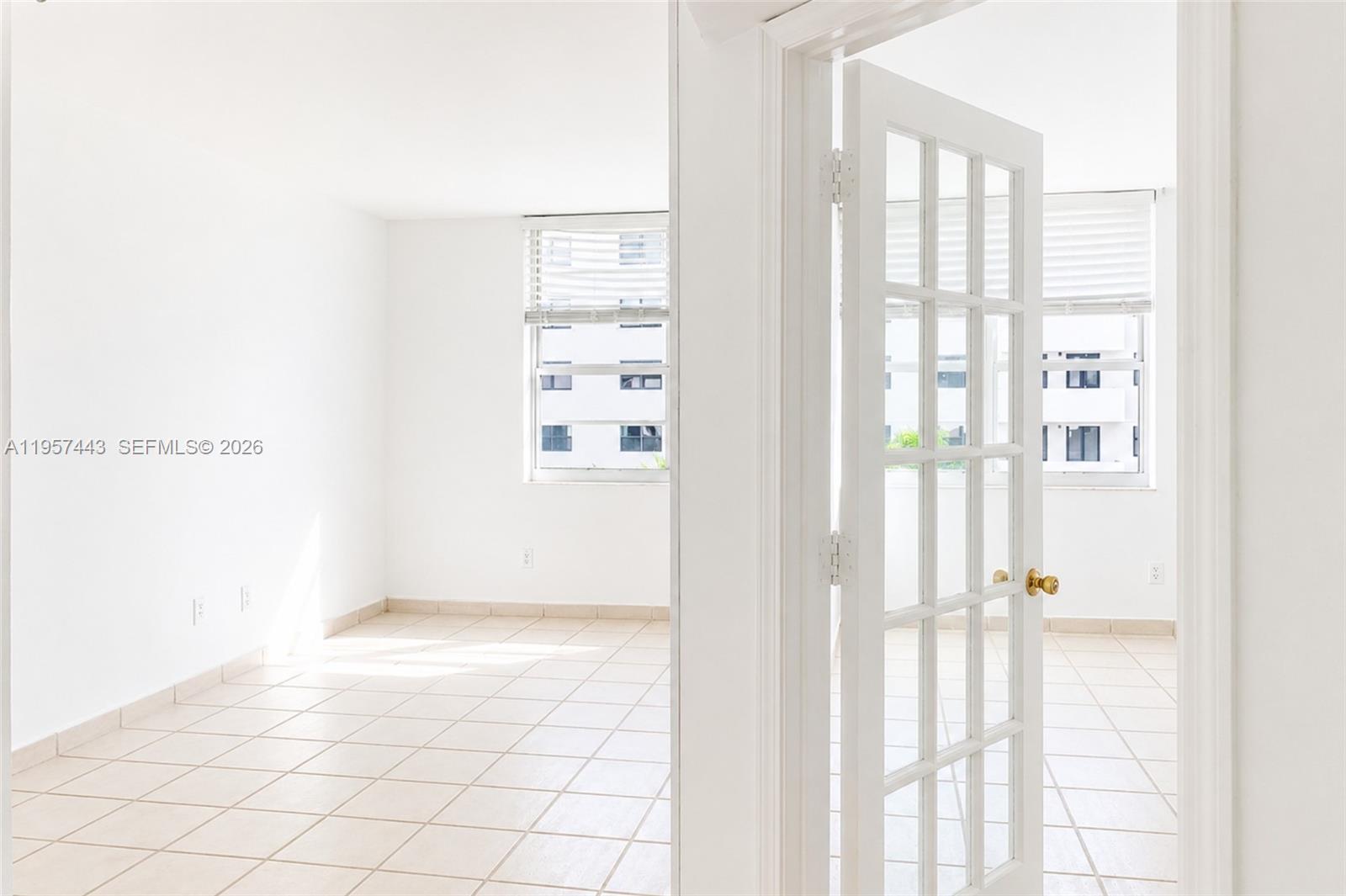100 Lincoln Road, Unit 732 Miami Beach, FL 33139 - Photo 5 of 20 a view of an empty room and window