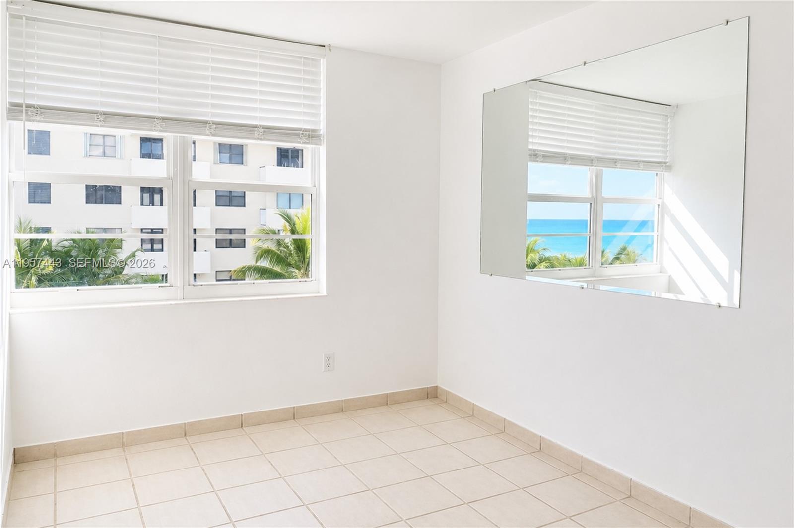 100 Lincoln Road, Unit 732 Miami Beach, FL 33139 - Photo 7 of 20 a view of an empty room with a window
