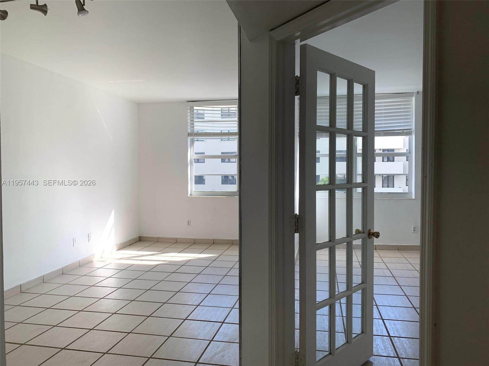 100 Lincoln Road, Unit 732 Miami Beach, FL 33139 - Photo 10 of 24 a view of entryway with wooden floor