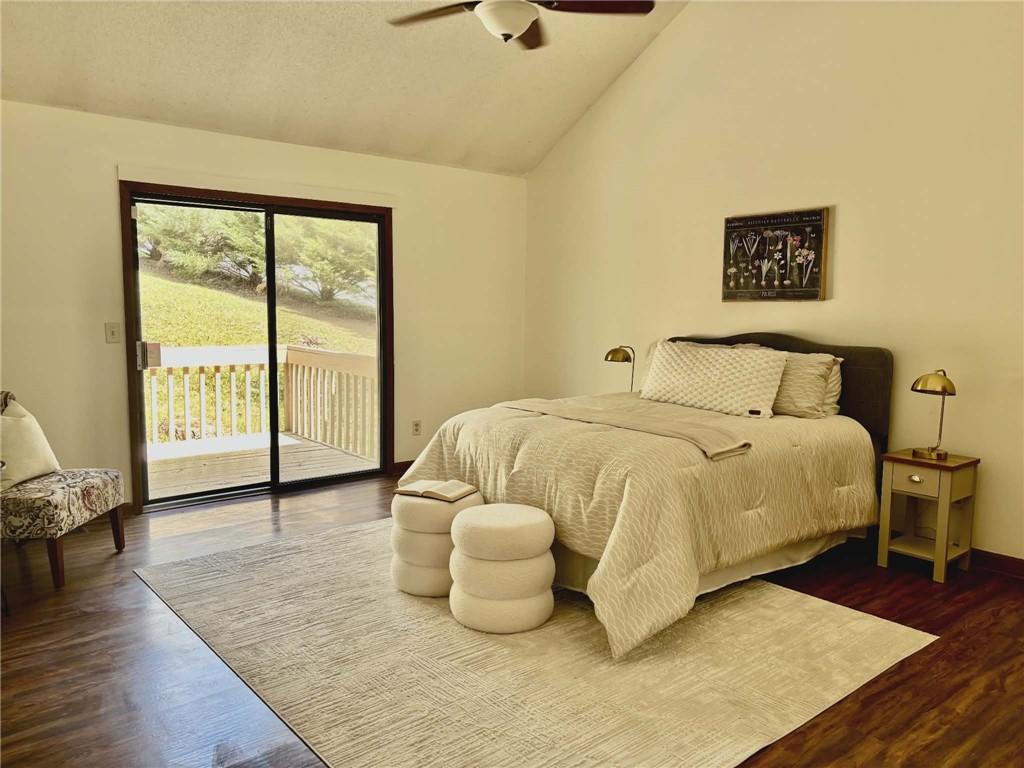 340 Farm Path Roswell, GA 30075 - Photo 11 of 21 a bedroom with a bed and wooden floor