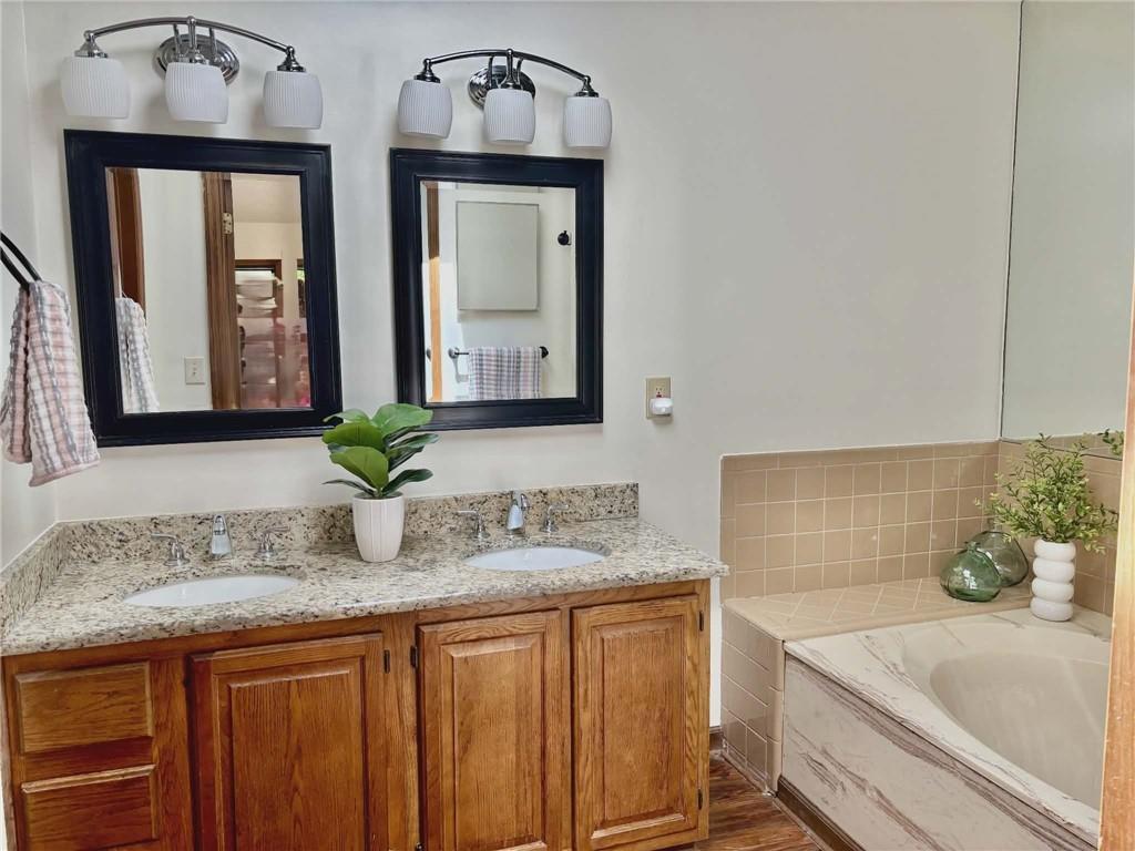 340 Farm Path Roswell, GA 30075 - Photo 12 of 21 a bathroom with sink and mirror