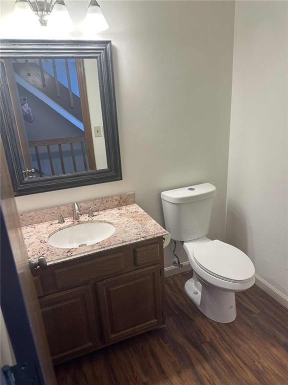 340 Farm Path Roswell, GA 30075 - Photo 15 of 21 a bathroom with a toilet a sink and mirror
