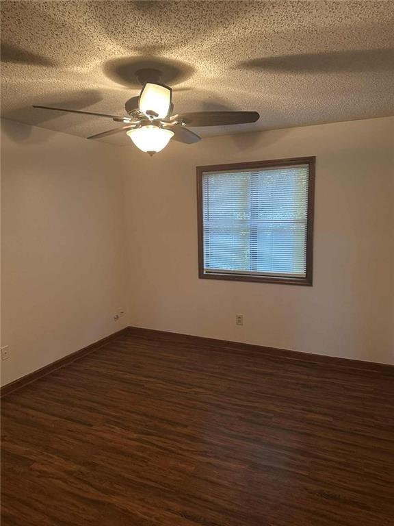 340 Farm Path Roswell, GA 30075 - Photo 16 of 21 a view of empty room with wooden floor