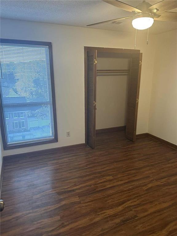 340 Farm Path Roswell, GA 30075 - Photo 18 of 21 a view of an empty room with wooden floor and a window