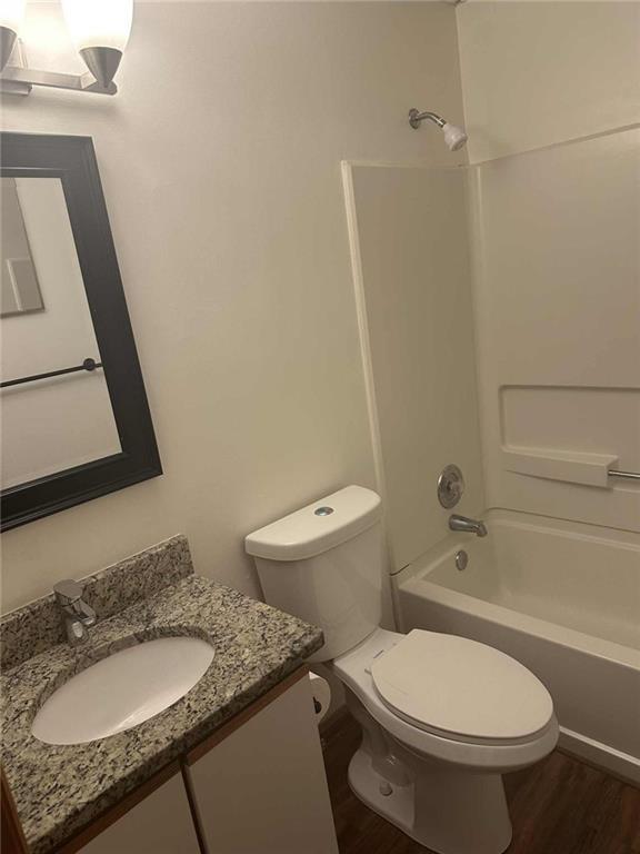 340 Farm Path Roswell, GA 30075 - Photo 20 of 21 a bathroom with a granite countertop toilet sink and mirror