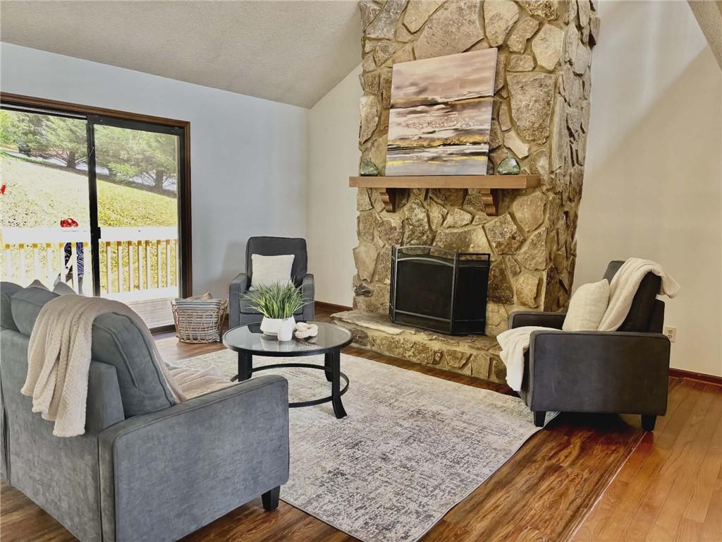 340 Farm Path Roswell, GA 30075 - Photo 4 of 21 a living room with furniture and a fireplace
