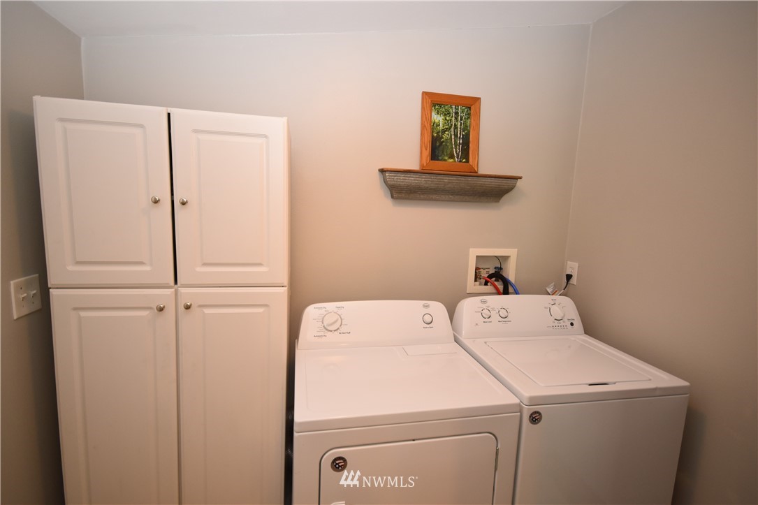 267 East Victor Road Belfair, WA 98528 - Photo 12 of 27 a utility room with dryer and washer