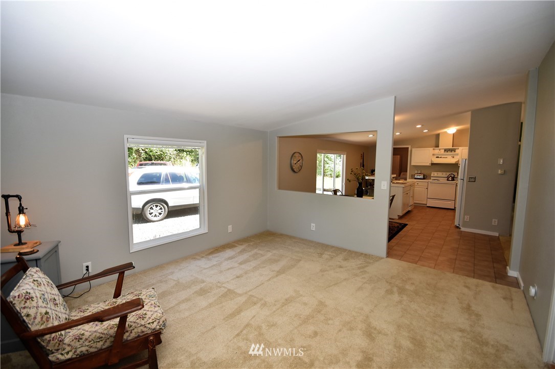 267 East Victor Road Belfair, WA 98528 - Photo 15 of 27 an empty room with windows and cabinet