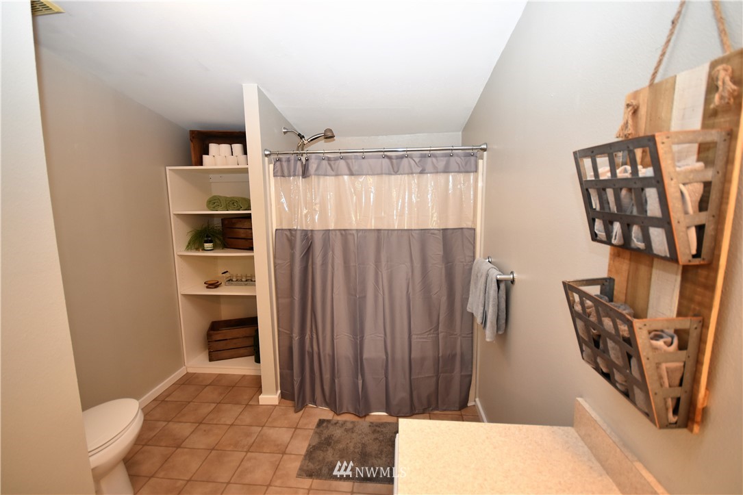 267 East Victor Road Belfair, WA 98528 - Photo 19 of 27 a view of a room with racks on the wall