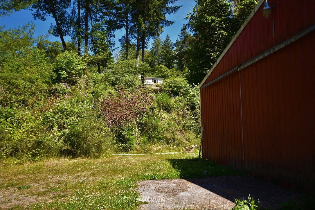 267 East Victor Road Belfair, WA 98528 - Photo 24 of 27 a view of a yard with plants