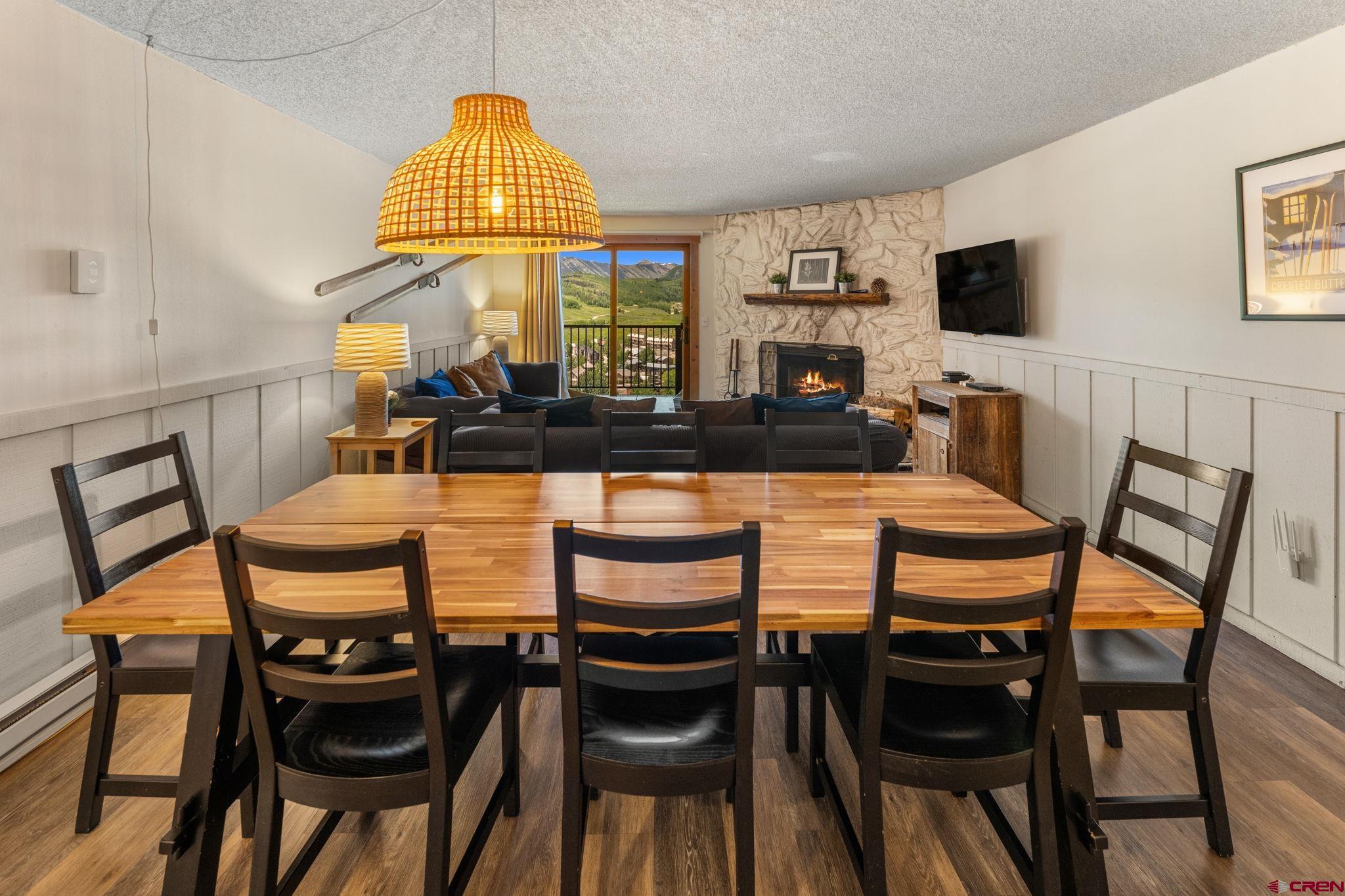 72 Hunter Hill Road, Unit I204 Crested Butte, CO 81225 - Photo 14 of 44 a view of a dining room with furniture