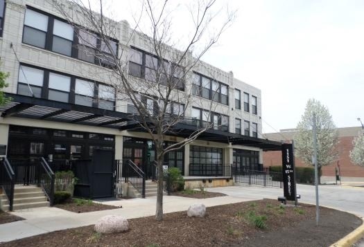 1151 West 15th Street, Unit 104 Chicago, IL 60608 - Photo 9 of 9 a view of a building with a large windows
