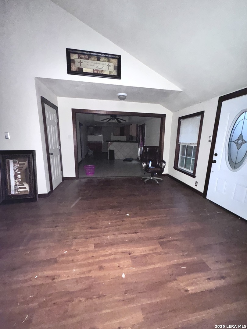18186 Wisdom Road Lytle, TX 78052 - Photo 15 of 28 a view of a livingroom with an empty space and a fireplace