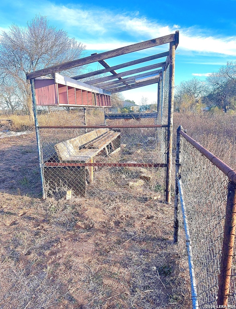 18186 Wisdom Road Lytle, TX 78052 - Photo 24 of 28 a view of a backyard