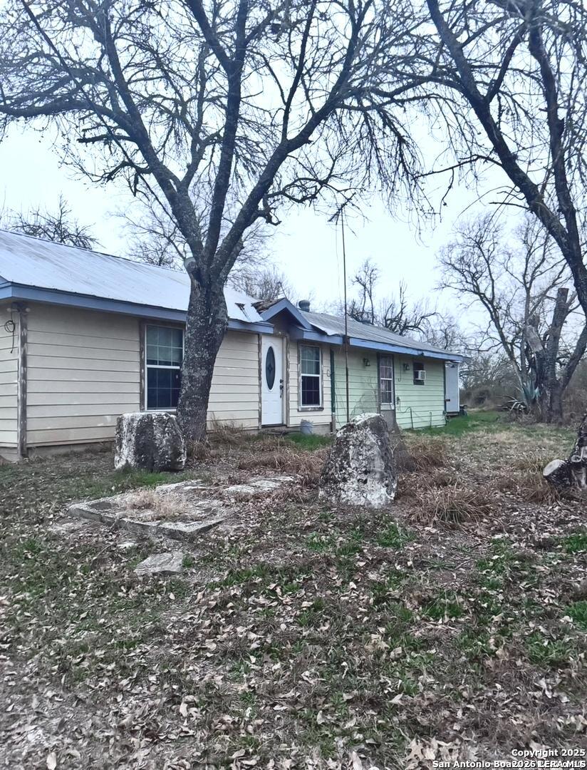 18186 Wisdom Road Lytle, TX 78052 - Photo 3 of 28 a view of a house with a yard