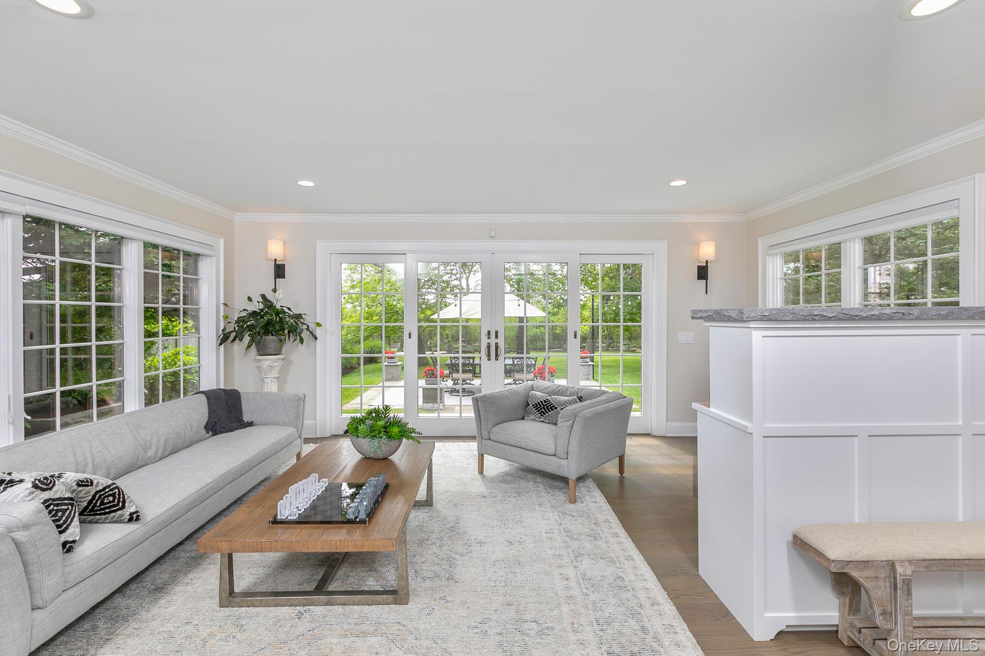 51 Halsey Road Remsenburg, NY 11960 - Photo 15 of 42 a living room with furniture and a large window