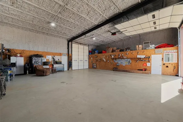 a workspace with furniture and window