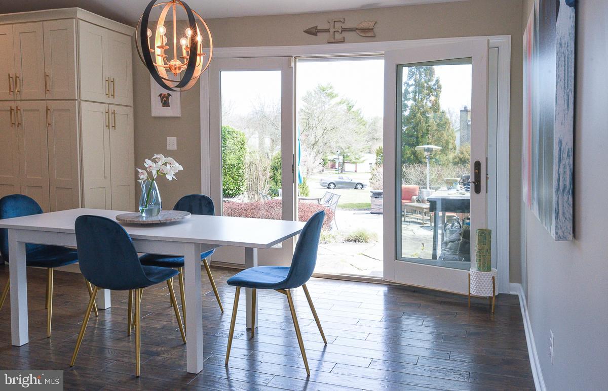 3301 Garrison Farms Road Pikesville, MD 21208 - Photo 11 of 41 Bright dining area with outdoor views.
