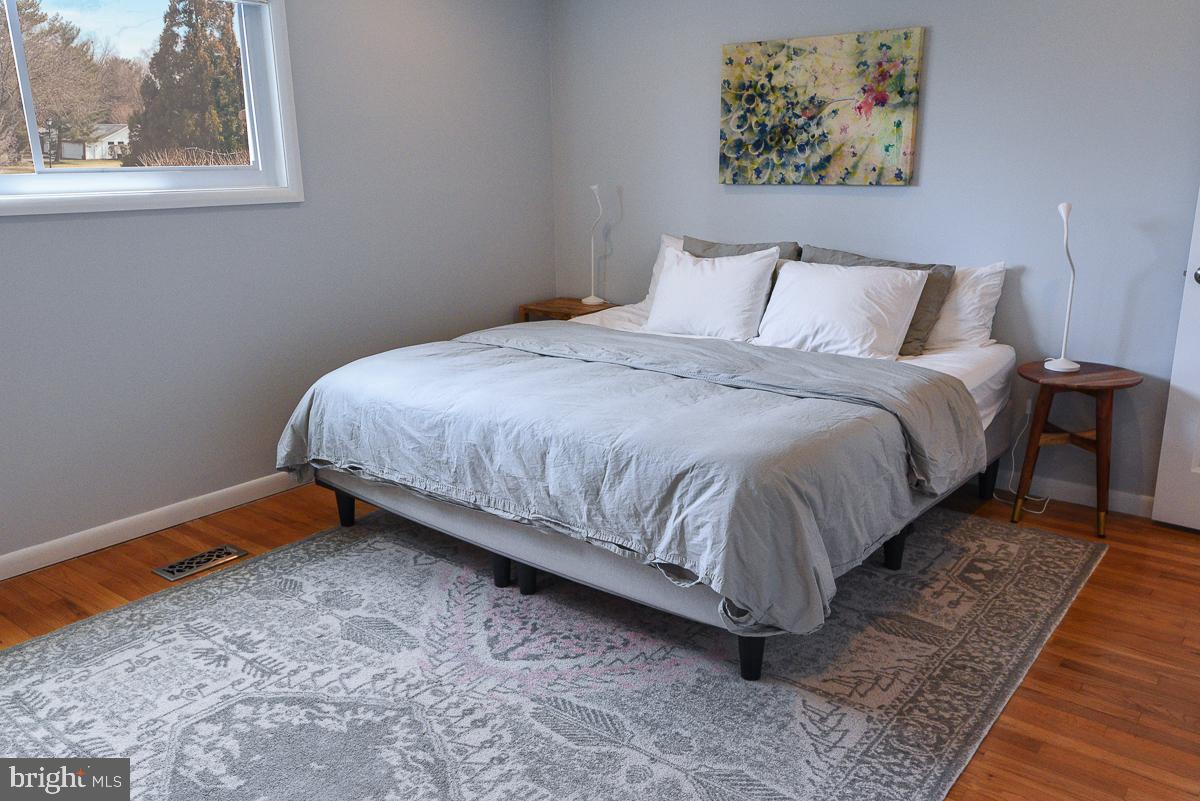 3301 Garrison Farms Road Pikesville, MD 21208 - Photo 13 of 41 Serene bedroom with soft, inviting tones.