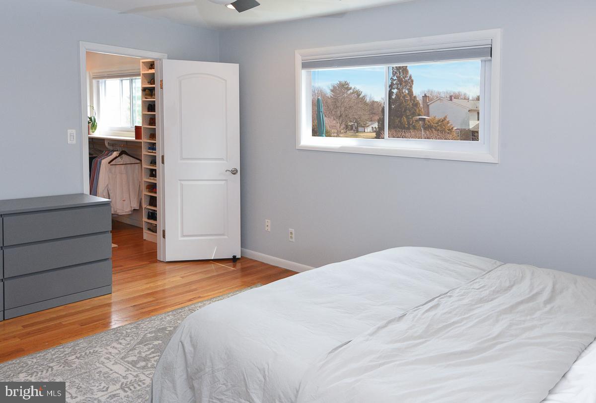 3301 Garrison Farms Road Pikesville, MD 21208 - Photo 17 of 41 Serene bedroom with natural light and style.