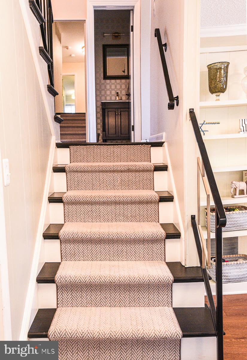 3301 Garrison Farms Road Pikesville, MD 21208 - Photo 26 of 41 Inviting staircase leading to serene spaces.